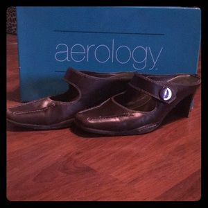 Pair of dark brown mules.